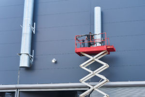 Aerial work platform (scissor lift) at work site