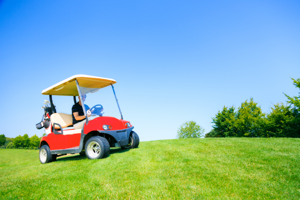 Golf car going up a hill
